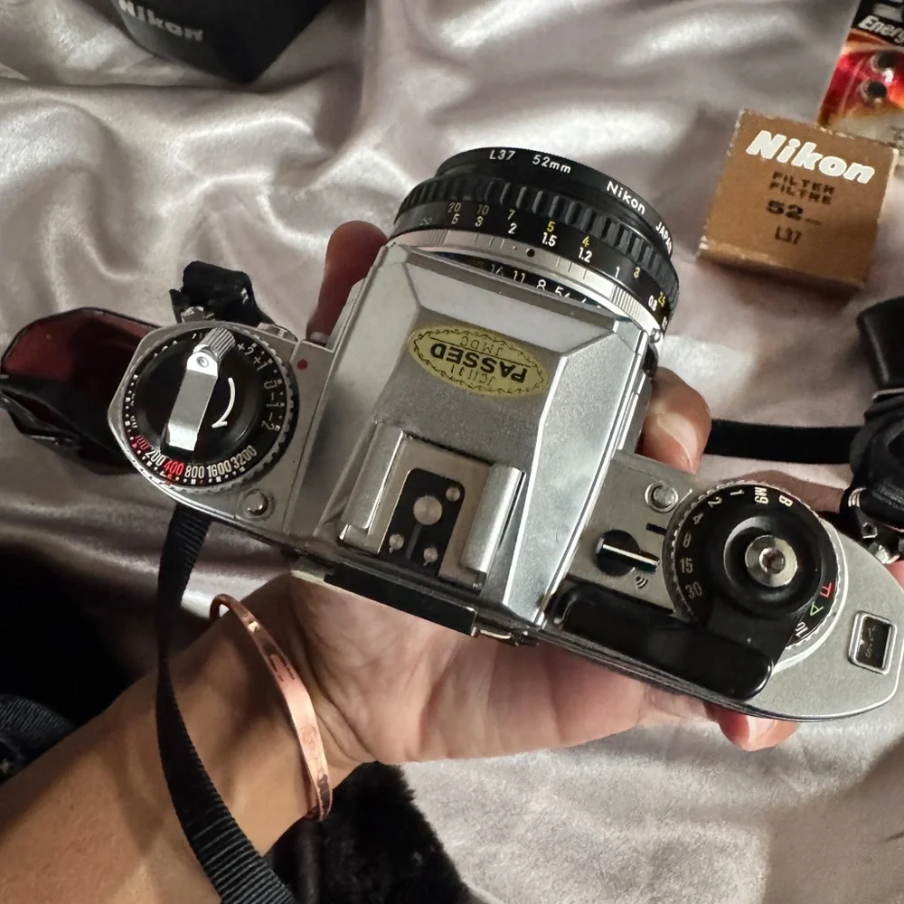 FG Nikon 35mm SLR camera with accessories
